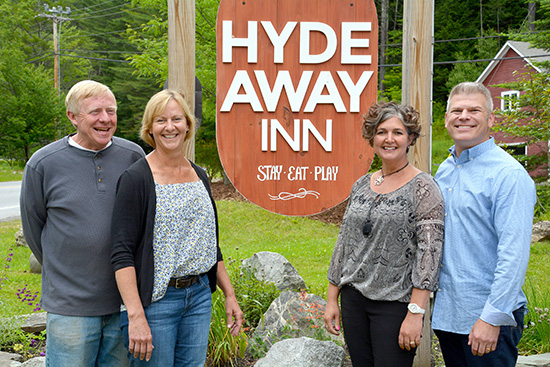 Previous owners Bruce and Margaret Hyde (L) with new owners Ana Dan and Paul Weber(R)